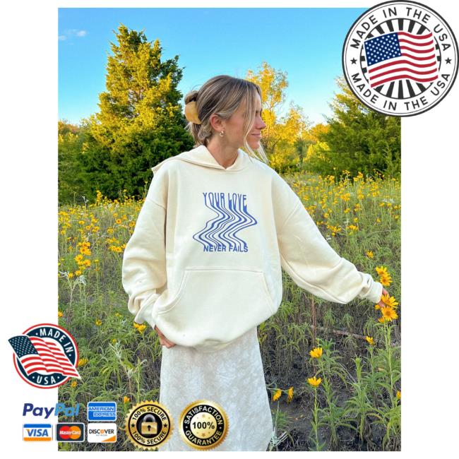 Official Elevated Faith Clothing Love Never Fails Cream Unisex Sweater